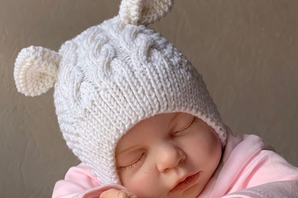 Особенности выбора шапочки для новорожденных